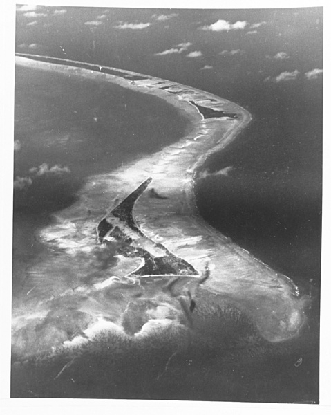 An aerial photograph of the south side of Tarawa Atoll, taken by Navy Squadron VC-24 on 9 September 1943, from an altitude of 3,660 m (12,000 ft). Betio Island is in the foreground, with Bairiki and Eita Islands beyond. The Battle of Tarawa took place on 20 November 1943 largely on Betio Island. Photo courtesy of the US Navy.