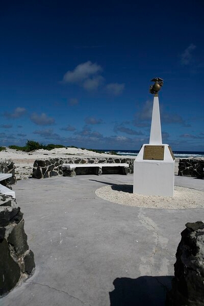 United States Marine Corps memorial to the defenders of Wake Island in December 1941. For 16 days, beginning 8 December 1941, a combined military force of Marine ground and air units, Naval aviation personnel, and an Army detachment - augmented by civilian contractors - resisted near constant attacks by Japanese forces. In the end the island defenders were overwhelmed by the Japanese forces who then occupied the atoll until the end of World War II. Photo courtesy of the USMC / Sgt. Bill Lisbon.