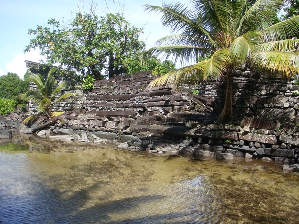 Nan Madol is an archeological site on Temwen Island in the present-day Madolenihmw district of Pohnpei state, in the Federated States of Micronesia. It was the ceremonial and political seat of the Saudeleur Dynasty, which ruled Pohnpei from about 1100 to 1628. This view of Nan Madol is from the lagoon.