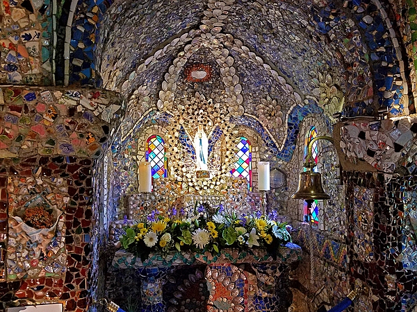 Interior of The Little Chapel in Les Vauxbelets Valley in Guernsey, constructed in 1914 by a Brother Deodat using broken china, seashells, and pebbles.  The Chapel is thought to be the smallest consecrated chapel in the world.