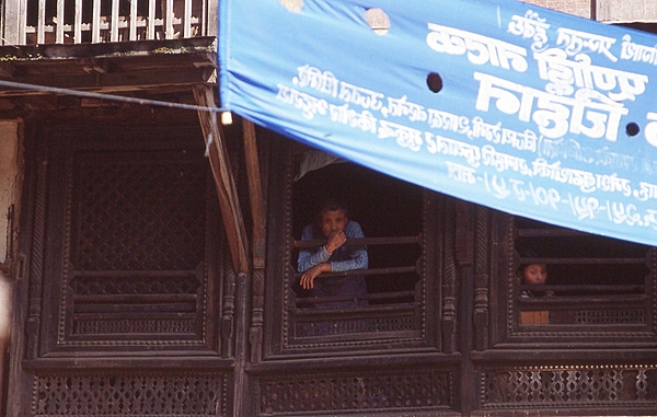 Carved wooden exterior facades are common on Kathmandu buildings and homes.