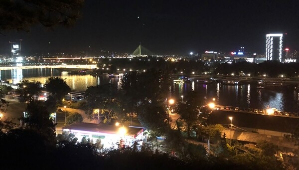 A view of Belgrade at night showing the Danube River.  Belgrade is the only European capital that lies at the confluence of two huge rivers – the Sava and Danube.