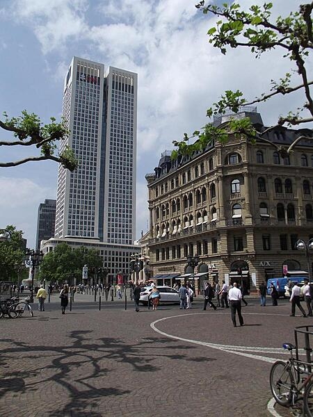 The Operturm (Opera Tower) in Frankfurt was opened in 2010 and is named after the Alte Oper (Old Opera House) that it faces, a corner of which may be glimpsed in the very center of the photo.