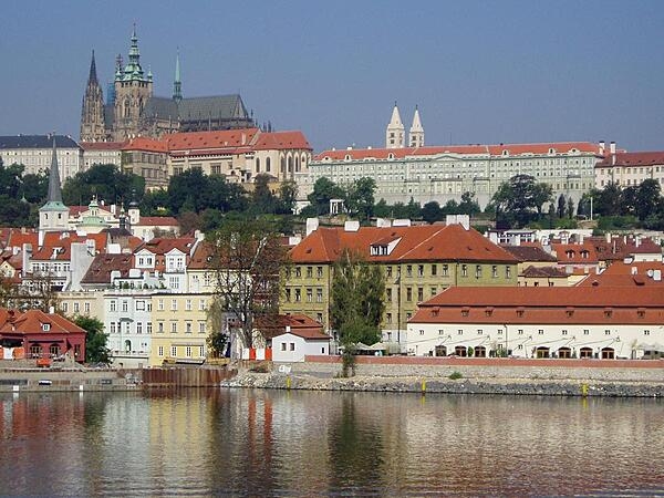 A view of Hradcany, the Castle District, and St. Vitus Cathedral from across the Vltava River in Prague.
