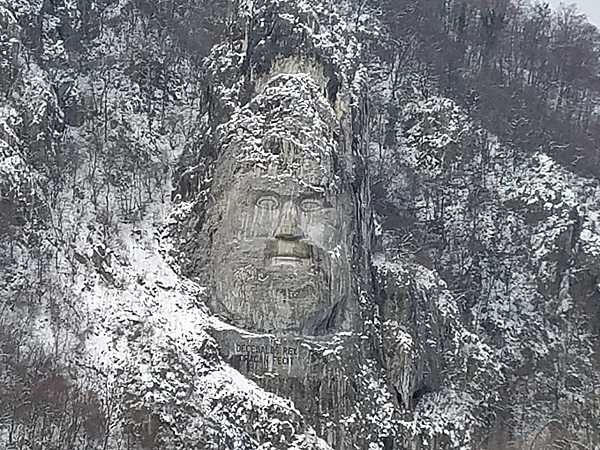 Rock carving on the Romanian side of the Danube River, depicting the Dacian King Decebalus (r. A.D. 87-106), who fought the Romans in the early 2nd century but was ultimately defeated. The carving, made between 1994 and 2004, is 42.9 m (141 ft) tall and 31.6 m (104 ft) wide.