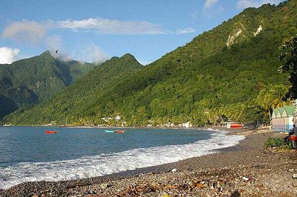 View of the south side of the island. Dominica features lush mountainous rain forests, and is the home of many rare plant, animal, and bird species (including the Sisserou Parrot featured on its flag).