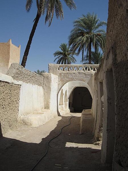 Ghadames is an oasis town located some 550 km (340 mi) southwest of Tripoli. The site was an important stop along the old caravan routes across the Sahara. Shown here is part of the Old City, which formerly was organized spatially and socially into seven clans. Ghadames became a UNESCO World Heritage site in 1986.