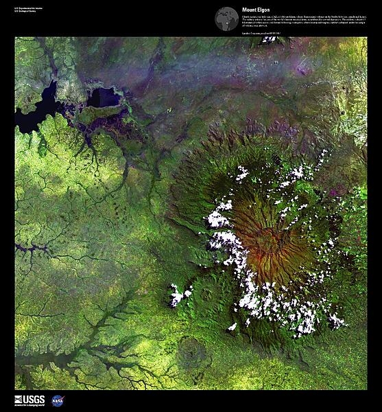 Clouds encircle the lofty rim of Mount Elgon, a huge, long-extinct volcano on the border between Uganda and Kenya, viewed in this enhanced satellite image. The solitary volcano has one of the world&apos;s largest intact calderas, a cauldron-like central depression. The caldera is about 6.5 km (4 mi) across and formed following an eruption, when the emptied magma chamber collapsed under the weight of volcanic rock above it. For active volcanoes in Kenya, see the Natural hazards-volcanism subfield in the Geography section. Image courtesy of USGS.
