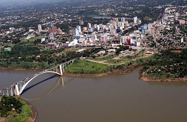 Ciudad del Este (Eastern City), formerly Puerto Presidente Stroessner, is a city in eastern Paraguay, on the bank of the Paraná River bordering Brazil. Ciudad del Este’s economy is fostered by its commercial connection with Brazil, symbolized by the 500-m (1,600-ft) Puente de la Amistad (Friendship Bridge) opened in 1965. The city’s tax-free status attracts many Brazilian and Argentine shoppers. Ciudad del Este has a humid subtropical climate.