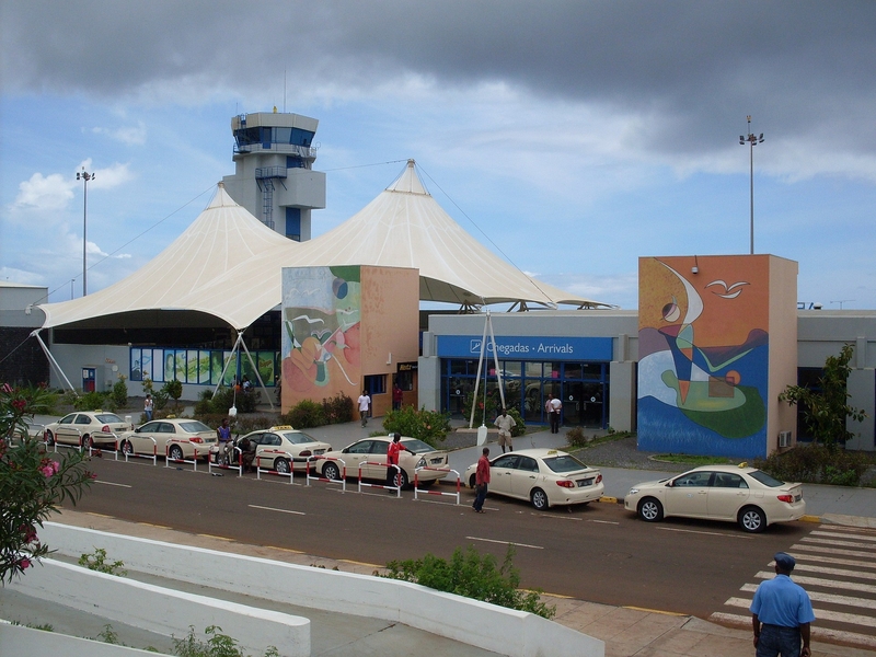 Taxis line the entrance to the arrival terminal at the Nelson Mandela International Airport (also known as Praia International Airport) on Sao Tiago Island in Cape Verde. The airport opened in October 2005.