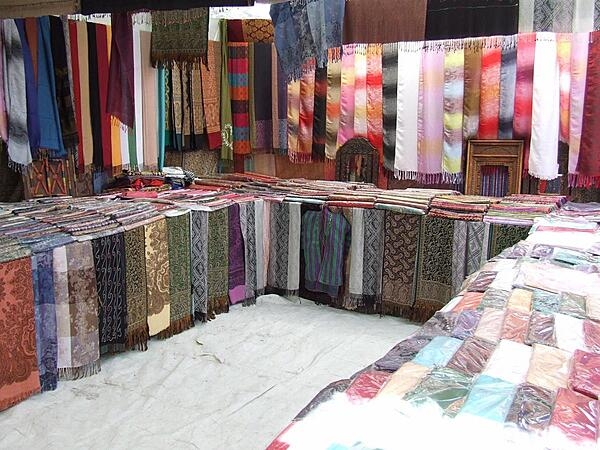 Fabrics displayed at a Kabul bazaar.