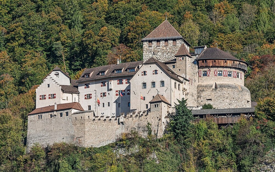 The home of Liechtenstein's royal family since 1712, Vaduz Castle was originally built in the 12th century to control the trade routes on the Alpine Pass. Towering 120 m (393 ft) above the capital city of Vaduz, the castle overlooks the Rhine River and the Swiss Alps and is a landmark in the capital city that is named after it.