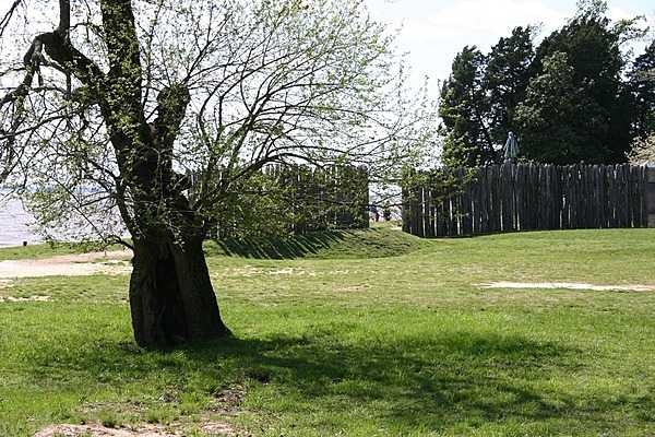 A view of the modern palisades marking the 1607 James Fort location at the Jamestown National Historic Site in Virginia. The statue inside the fort is of John Smith, who played an important role in establishing Jamestown as the first permanent English settlement in America. Photo courtesy of the National Park Service.