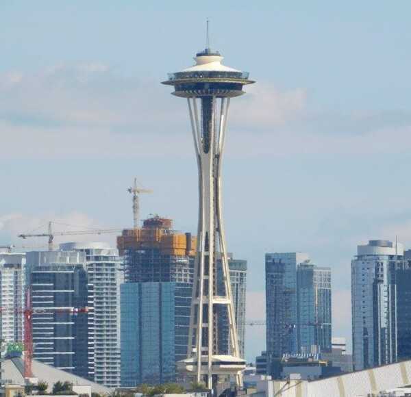 The Space Needle in Seattle, Washington, officially opened to the public on 21 April 1962 as part of the  Century 21 Exposition, a space-age-themed world's fair. The iconic  steel structure stands 184 m (605 ft) tall and offers 360-degree views.
