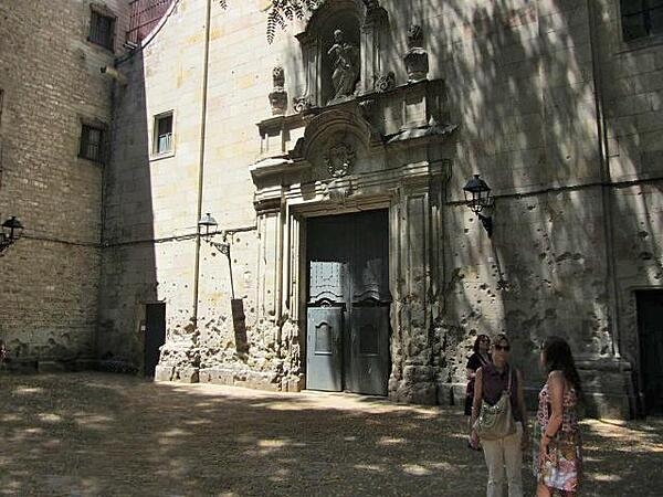 Damage from the Spanish Civil War (1936-1939) can be seen on this church wall in the Old City in Barcelona, Spain.