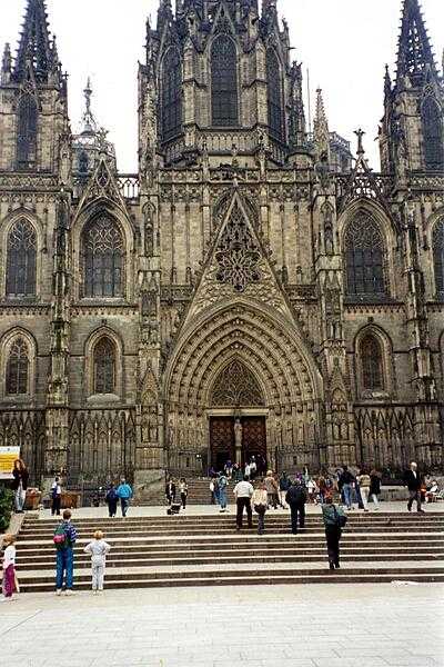 The neo-Gothic façade of the Cathedral of the Holy Cross and Santa Eulalia in Barcelona, Spain.