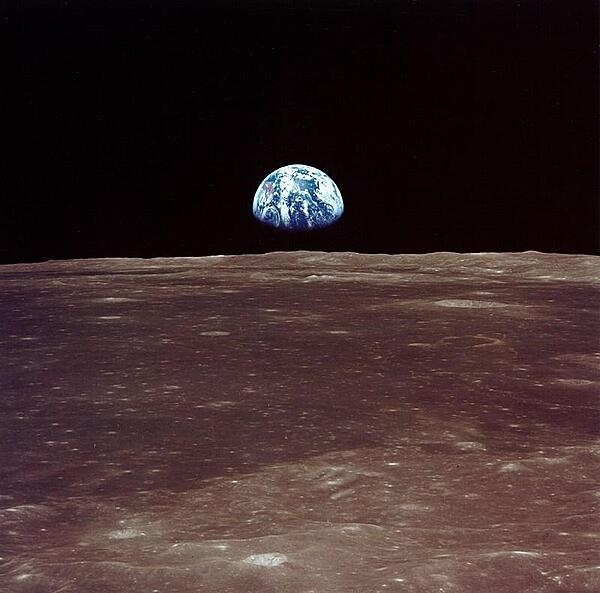 Apollo 11 Earth-rise from lunar orbit. Image courtesy of NASA.