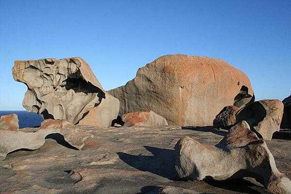 Remarkable Rocks on Kangaroo Island, South Australia, are natural sculptures -- some over 7 m (22 ft) tall -- formed by wind, rain, and sea spray.