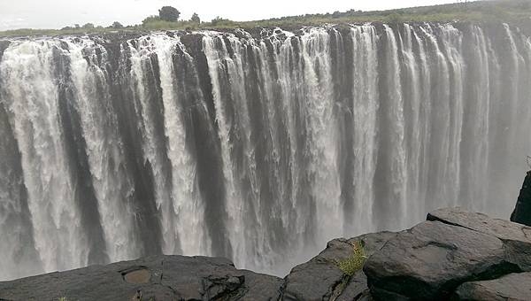 A closer view of Victoria Falls' plunging waters. The falls are located between the borders of Zambia and Zimbabwe.
