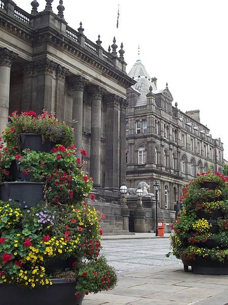 Flower display in front of Leeds Town Hall; the Leeds Art Gallery is in the background.